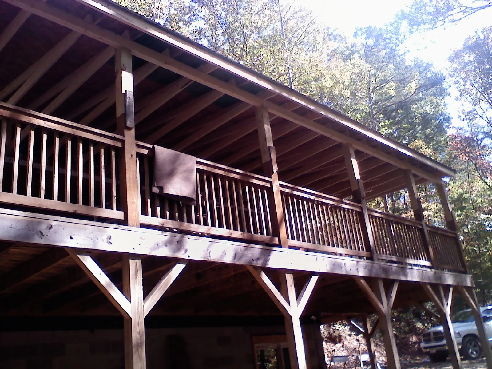 Timber framing under a new elevated porch and deck — Roof Leak Repair in Boomer by Roofing Brothers